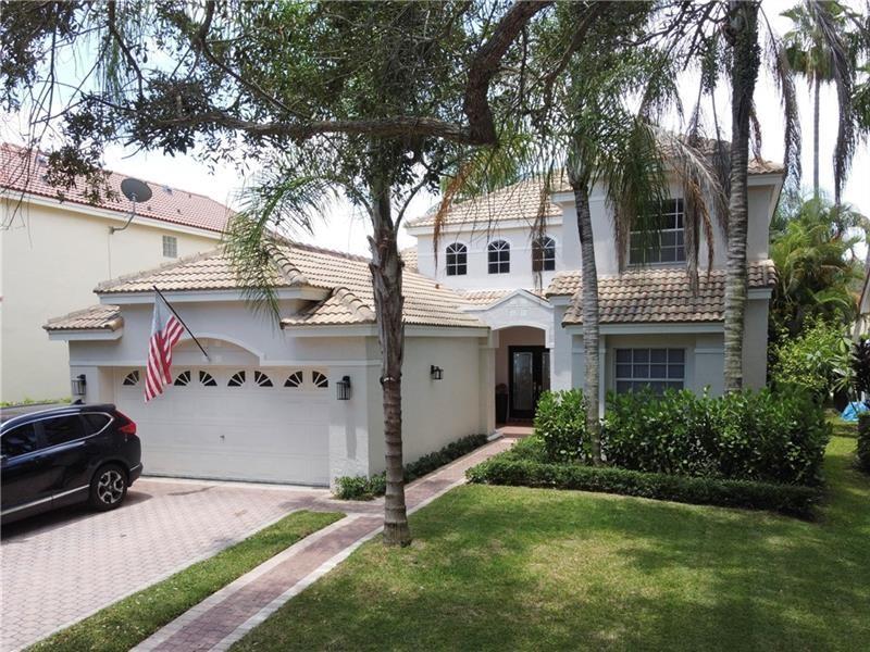 Stately 2-story lakefront FURNISHED home located in the Hibiscus Island neighborhood of Weston. Home features 3Bedrooms, 2.5 Bathrooms + Den space (playroom or home office) and tall ceilings filled with natural lighting. Enjoy sunsets over the long lake views from the screened enclosure under the shade of mature coconut trees. Hibiscus Island is a gated community near Weston Town Center that features a community pool, playground, basketball court and shady tree lined streets. Well located to A rated schools Indian Trace Elementary (biking distance), Tequesta Trace Middle (walking distance) and Cypress Bay High School. Available June 15th, 2023. Home is being rented furnished.