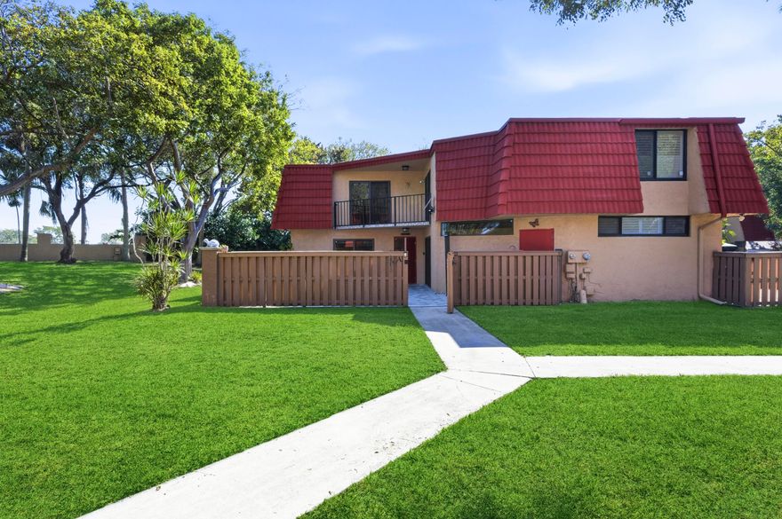 Fully renovated 2-bedroom, 2.5-bath townhome with a private, fully fenced courtyard—perfect for entertaining. Located in one of the most private spots in the community, this home is a must-see. Updates include wood-look tile flooring downstairs, laminate flooring upstairs, and a modern kitchen with oversized granite countertops and backsplash. The guest bathroom has been completely renovated and includes a tub, and both bedrooms feature custom closet doors. New hurricane shutters make storm prep easy. Convenient to Florida's Turnpike and nearby shopping and dining. Rare opportunity in a quiet, family-friendly neighborhood with amenities including a pool, hot tub, tennis courts, and gym. New A/C in 2019.