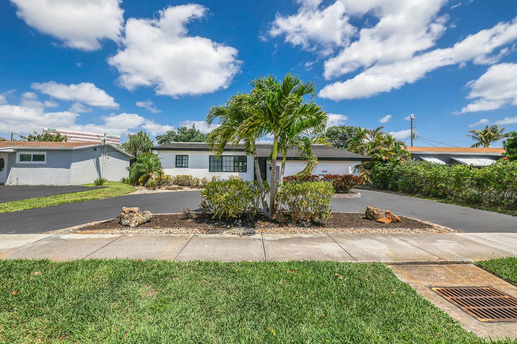 Photo of 101 NE 57th Court, Fort Lauderdale, FL 33334 (MLS # B26018874)