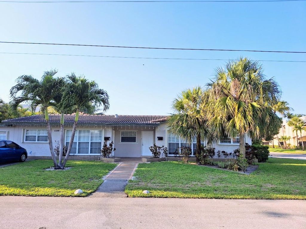 Photo of 1599 NE 34th Street #A, Oakland Park, FL 33334 (MLS # F10498830)