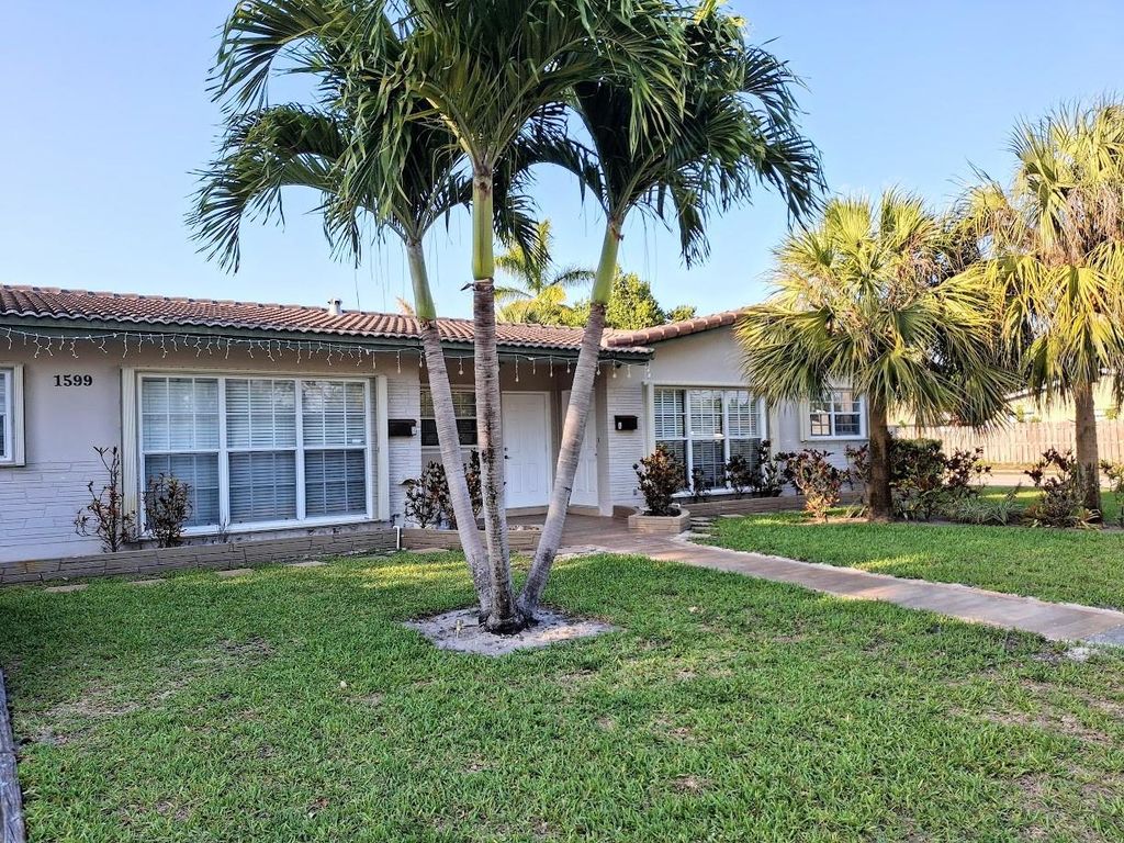 Photo of 1599 NE 34th Street #A, Oakland Park, FL 33334 (MLS # F10498830)