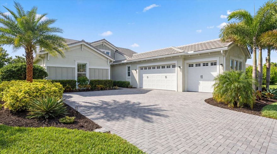 Welcome to this beautifully maintained Sandhill model in the Meadows of Westlake, offering a versatile layout, key upgrades, and a lake-view setting. Featuring 3 bedrooms, 3 full bathrooms, plus a den that can easily function as a 4th bedroom, office, or flex space.  The kitchen is bright and inviting, featuring white Shaker cabinetry with extended upper cabinets, granite countertops, a gas cooktop, a wall oven and microwave, and a built-in workspace with additional cabinetry. The primary suite is a true highlight, offering a fully upgraded bathroom with updated flooring, cabinetry, and quartz countertops, along with a separate soaking tub and walk-in shower, a rare offering for this model.  The 3-car garage offers extra storage, a utility sink, and side door access. Additional features include full-impact windows, gutters, a Tesla charger, a water softener, and under-sink filtration systems.   The fully fenced backyard includes an electric retractable awning, toad buster screen, and permanent Govee lighting throughout the property.   Situated on a unique lot with additional space providing separation from neighboring properties, featuring lush landscaping throughout.  Enjoy lake views and gorgeous sunsets from your own backyard.    Located in Westlake, Palm Beach County's newest and fastest growing city, residents enjoy a vibrant lifestyle with golf cart-friendly living and resort-style amenities, including Adventure Park with pools, splash pad, playground, BMX pump park, basketball courts, fitness trail, and more.  This is more than just a home; it's a lifestyle you do not want to miss.