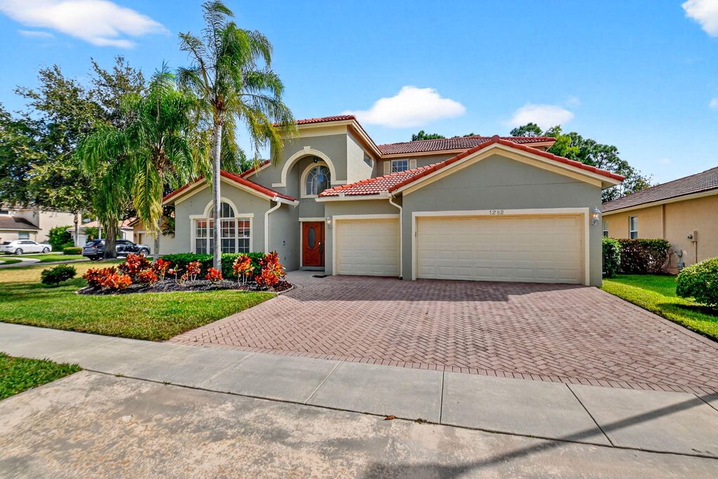 Photo of 1282 Pebble Ridge Lane, West Palm Beach, FL 33411 (MLS # R11102435)
