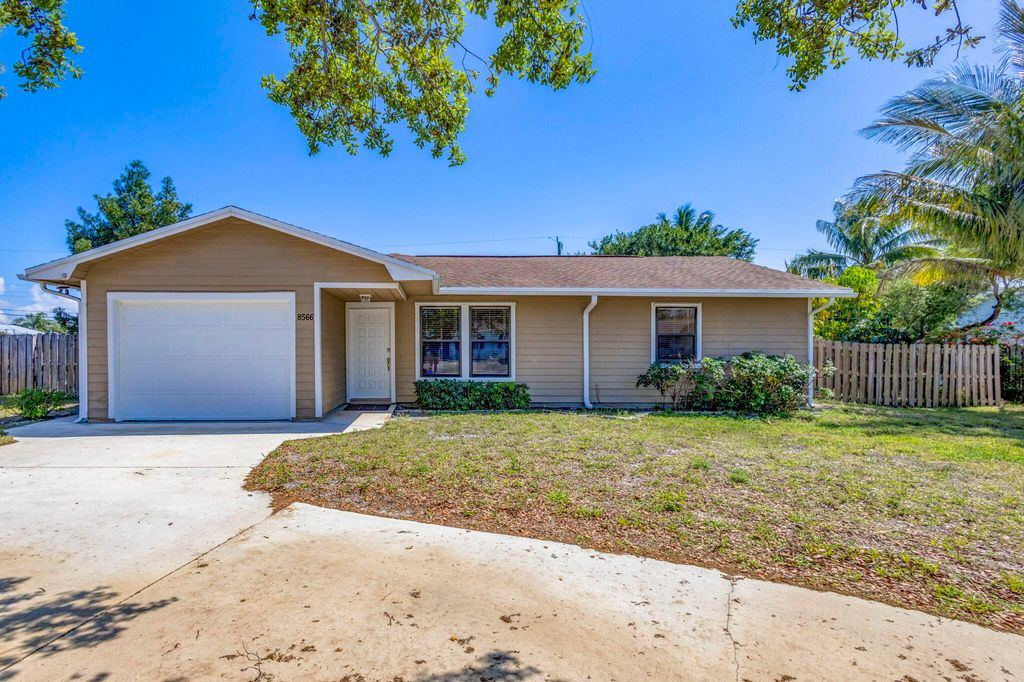 Photo of 8566 SE Lyons Road, Hobe Sound, FL 33455 (MLS # R11076180)