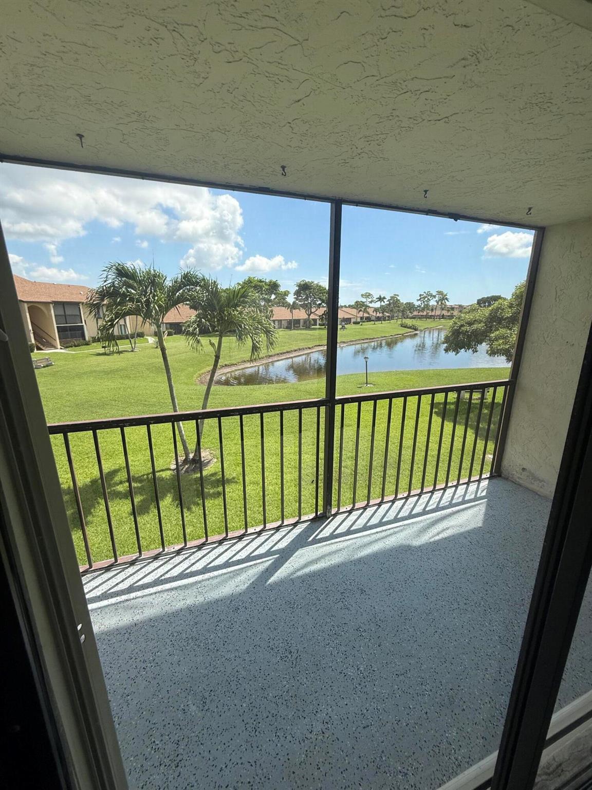 Excellent location well quiet ADULT 55+ Community 1rst floor unit offering 2 Bedrooms, 2 Bathrooms, bright natural light, impact windows, screened covered patio with accordion shutters. Featuring a spacious layout new tile , freshly painted.shared grill area, pickleball & amenities, 2 vehicles permitted, pick-up trucks, motorcycles, 1 pet. Great location, close to Publix shopping center, restaurants, parks, library, beaches, airport, easy access to I-95 & Turnpike