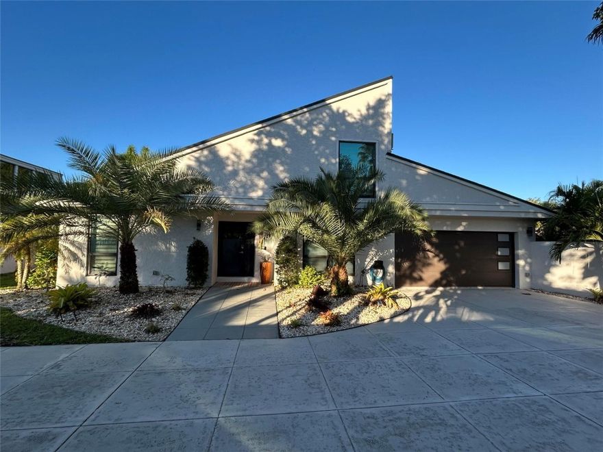 Impeccable 4/3 home in fabulous Plantation! Be close to everythingl. Huge property has privacy wall on quiet Cul de Sac, ample driveway for many cars. This home checks all the boxes for those seeking space for family life, entertainment and can be a quiet paradise like retreat! Flowing open-concept interior with soaring wood ceilings leads to your own outdoor paradise starring big 2023 saltwater pool with heat and chill features! Beautiful modern kitchen opens to dining room and spacious living area, big primary bedroom offers updated bath, custom closet and lots of space. All appliances are newer and staying, check out interior laundry room with cabinets. Fourth bedroom currently being used as office. Impact windows: 2020, HVAC 2022, Roof 2018, Electrical panel 2020, tankless H2O heater.