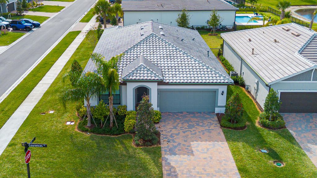 Photo of 758 SE Courances Drive, Port Saint Lucie, FL 34984 (MLS # R11151268)