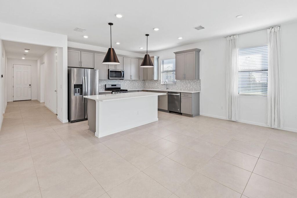 Photo of 758 SE Courances Drive, Port Saint Lucie, FL 34984 (MLS # R11151268)