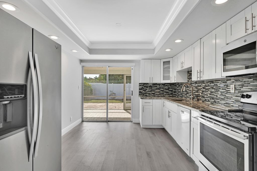 Photo of 104 Palamino Circle, Boca Raton, FL 33487 (MLS # R11167681)