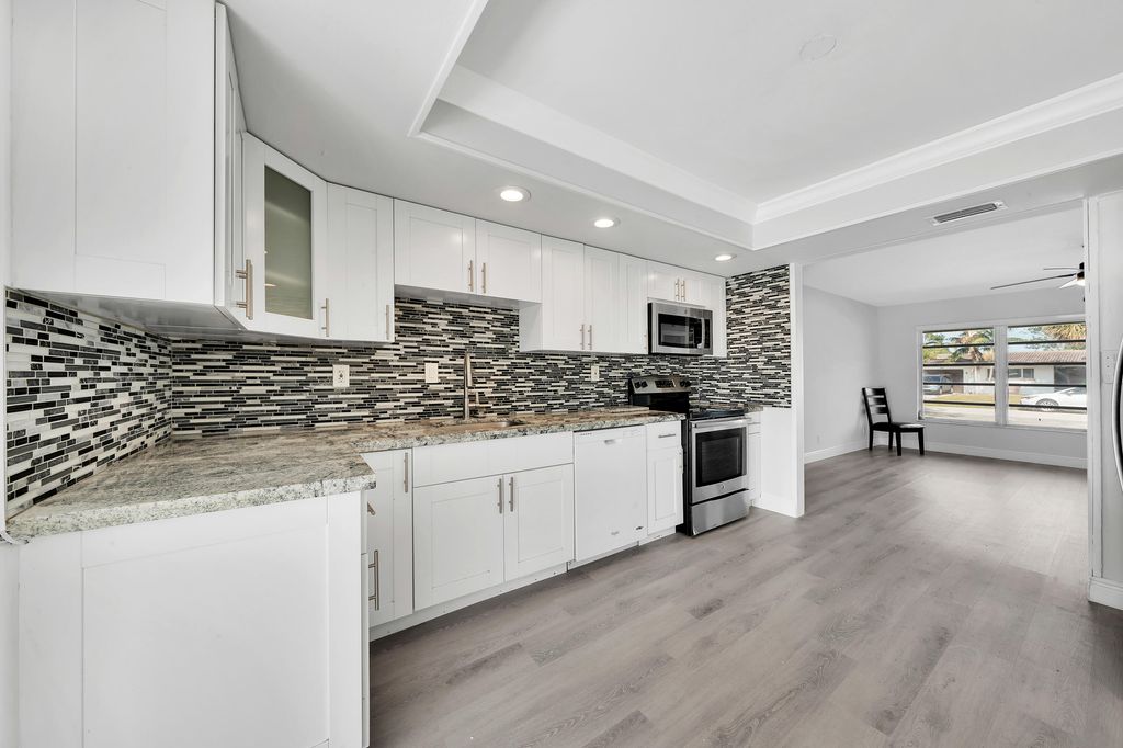 Photo of 104 Palamino Circle, Boca Raton, FL 33487 (MLS # R11167681)