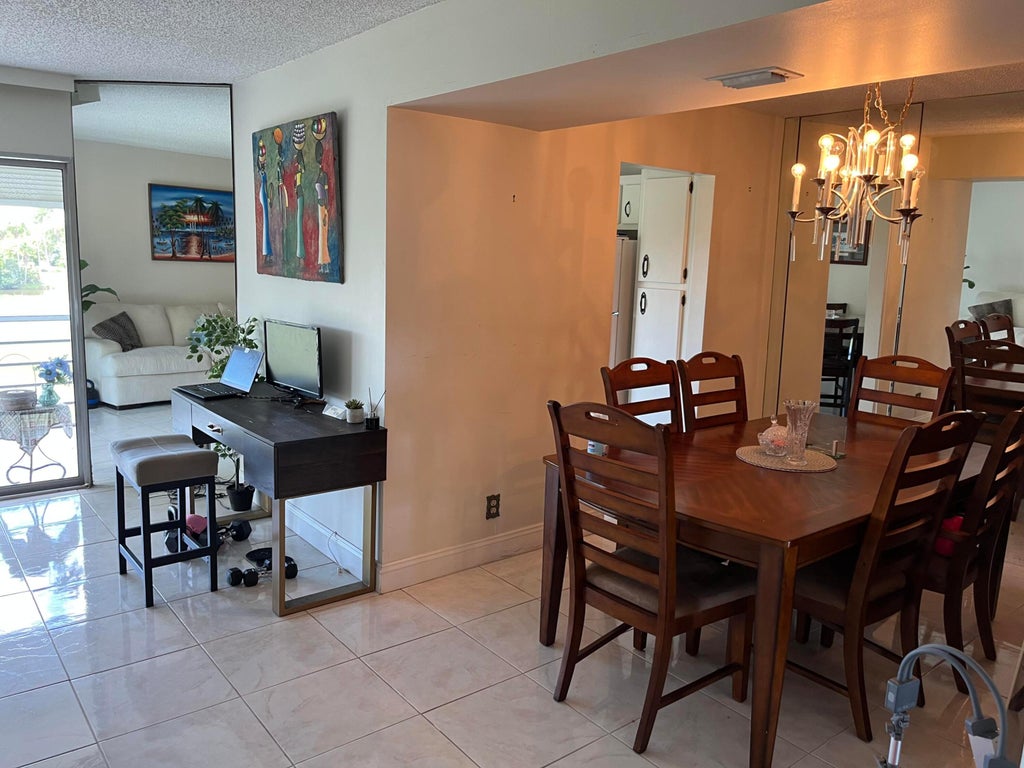 Photo of 3871 VIA POINCIANA #402, Lake Worth, FL 33467 (MLS # B26089791)