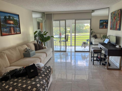 Photo of 3871 VIA POINCIANA #402, Lake Worth, FL 33467 (MLS # B26089791)