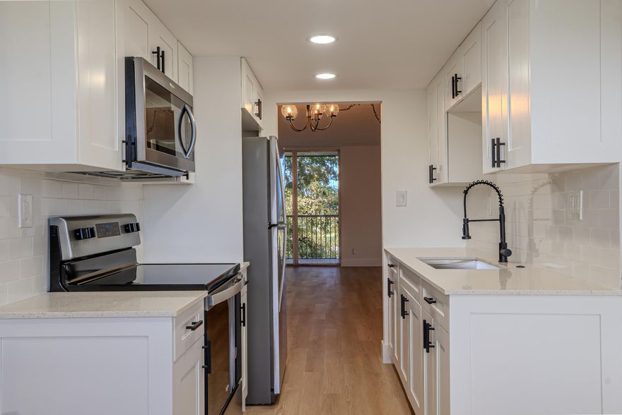 Fully renovated 2-bedroom, 2-bath condo located in the gated Cypress Chase community in the heart of Lauderdale Lakes. This bright and spacious unit features a completely updated interior with a modern kitchen, white cabinetry, quartz countertops, stainless steel appliances, and beautifully renovated bathrooms. The open layout offers great natural light and comfortable living spaces throughout.  The laundry is located in the balcony. Enjoy relaxing from the private balcony with peaceful water views. The community offers amenities including a pool, clubhouse. Conveniently located near shopping, dining, major highways, and public transportation. Move-in ready and a great opportunity to own a beautifully updated home. Association requirements: No pets allowed. Minimum income of $40,000 per year and minimum credit score of 650 required. No rentals permitted. One assigned parking space per unit. A second vehicle may park in guest parking only. All vehicles must park head-in only. A $50 transponder is required for each vehicle. Basic cable and internet are included.