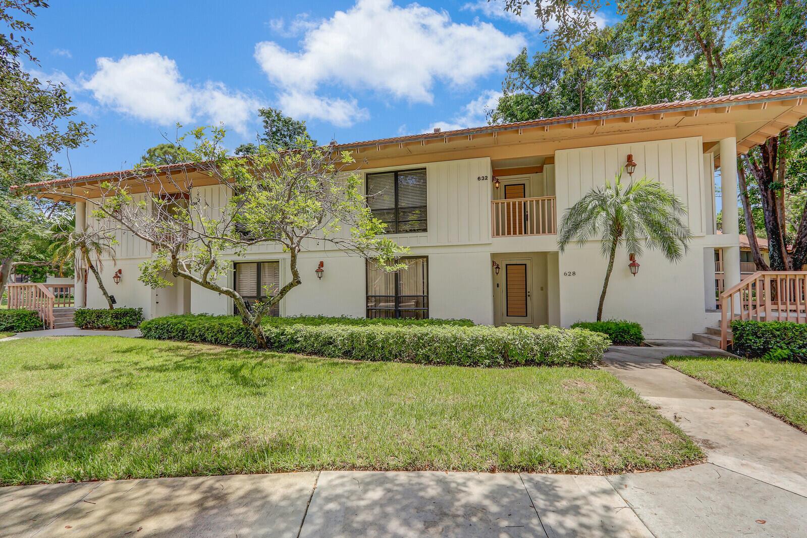 Experience the perfect blend of luxury, comfort, and convenience in this beautifully remodeled 2BR/2BA 2nd-floor corner unit in Golf Villas, PGA National. Elegant decor, split floor plan with private suites. Master offers king bed, ensuite & ample closets; guest suite features queen bed & walk-in closet. Wrap-around screened lanai with serene banyan tree views. Steps to community pool, in-unit laundry. Prime location near PGA National Golf Club, world-class dining, shopping & beaches.