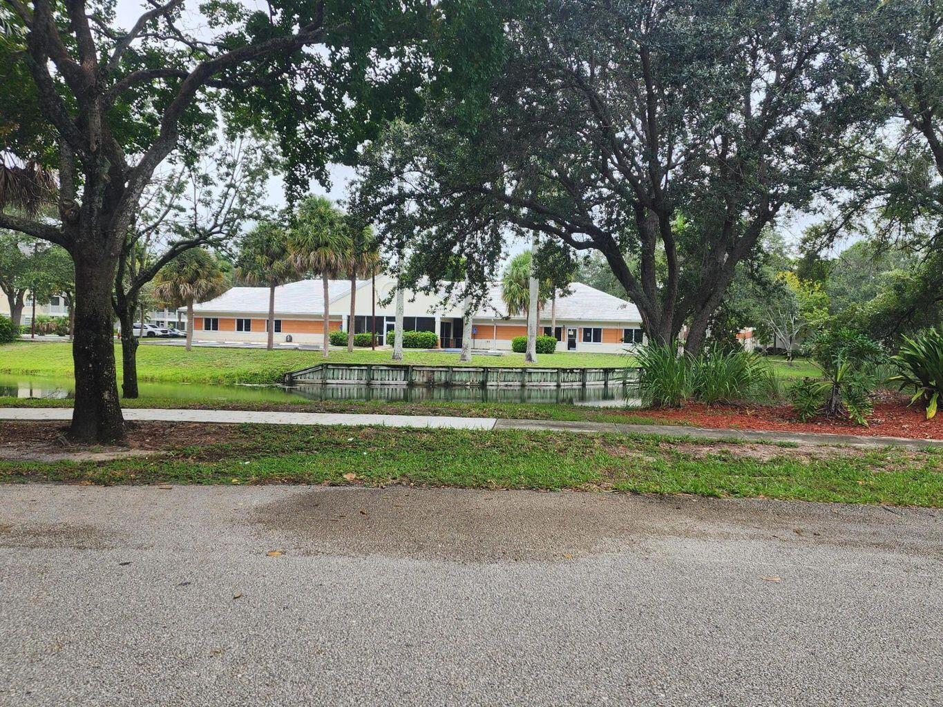 Come see this beautifully remodeled free-standing current use as a medical building with Ample parking conveniently located off Hypoluxo and 95. The building is utilized as an adult daycare facility. The building was designed to accommodate medical, rehab, special use, religious etc. boasting Handicapped bathrooms as well as several common work areas and a full kitchen. There are additional sinks & tons of storage spaces. TEN separate offices/rooms Five bathrooms a myriad of common areas, conference room, and reception area.. Building Can be used as a regular office setting. There is a very large screened in private patio area overlooking a beautiful pond. The building sits on 1.33 acres of land. all information must be verified by agent