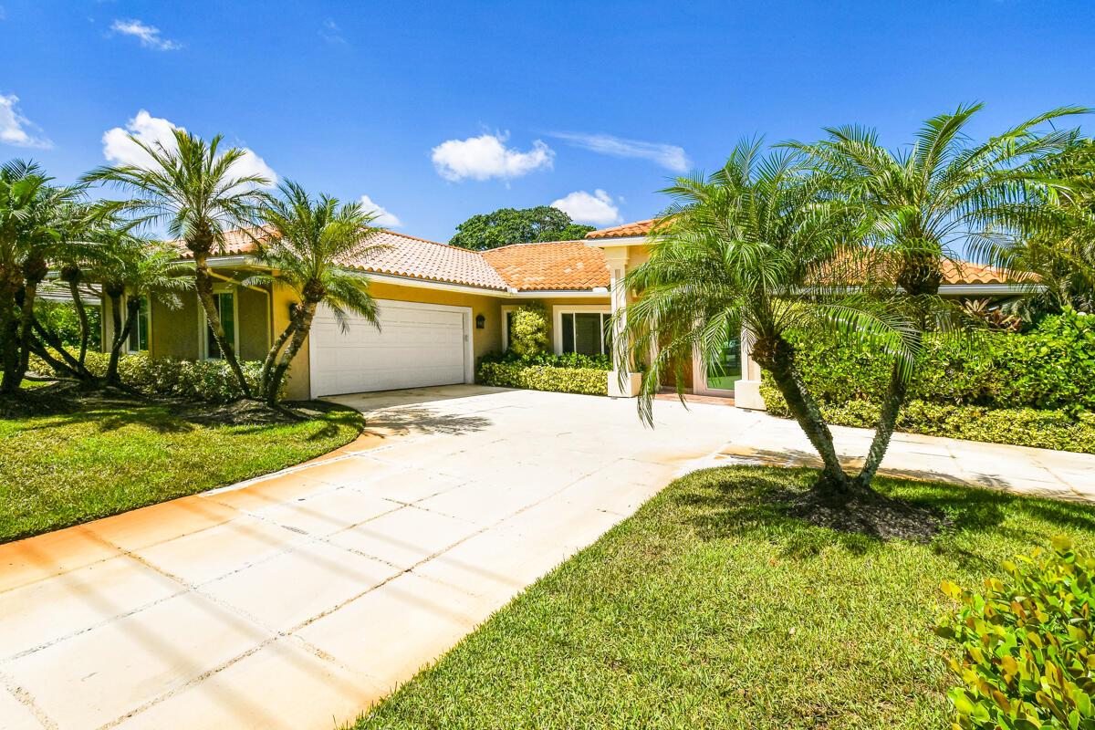 Elegance & comfort can be found throughout this well designed pool home with panoramic golf course & water views situated on a scenic lot in the Tequesta Country Club. Some of the highlights of 3/2.5 beauty are a bright & sunny master suite complete with oversized walk in closet, luxurious bathroom with whirlpool tub, a versatile office/den, a desirable split plan for privacy & functionality plus an open kitchen with center isle, ample cabinetry & granite counters. Additional features include high ceilings, impact-rated windows, accordion shutters breakfast area, a spacious 2 car garage. The large screen enclosure includes a sparkling heated pool, a covered lanai and amazing golf course & lake views. Tequesta CC residents also have access to a dock & ramp on the Loxahatchee River.