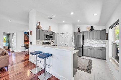 Tiny photo for 1973 NW 45th Street, Oakland Park, FL 33309 (MLS # B26007727)