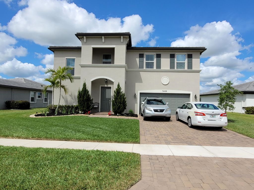 Photo of 7488 NW Farnsworth Circle, Port Saint Lucie, FL 34987 (MLS # R10794214)