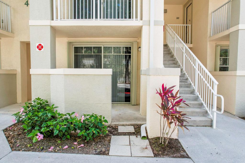 Photo of 4850 Chancellor Drive #11, Jupiter, FL 33458 (MLS # R10990481)