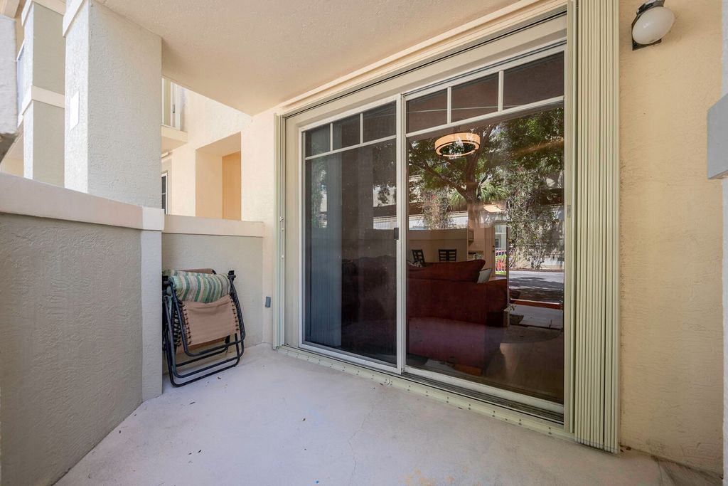 Photo of 4850 Chancellor Drive #11, Jupiter, FL 33458 (MLS # R10990481)