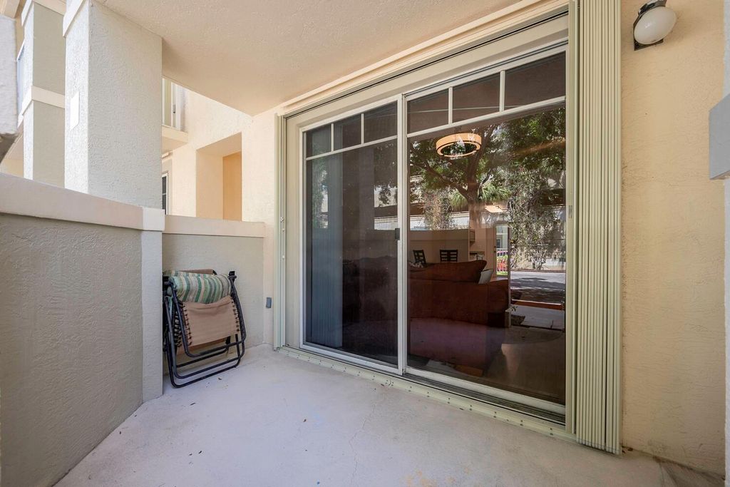 Photo of 4850 Chancellor Drive #11, Jupiter, FL 33458 (MLS # R10990481)