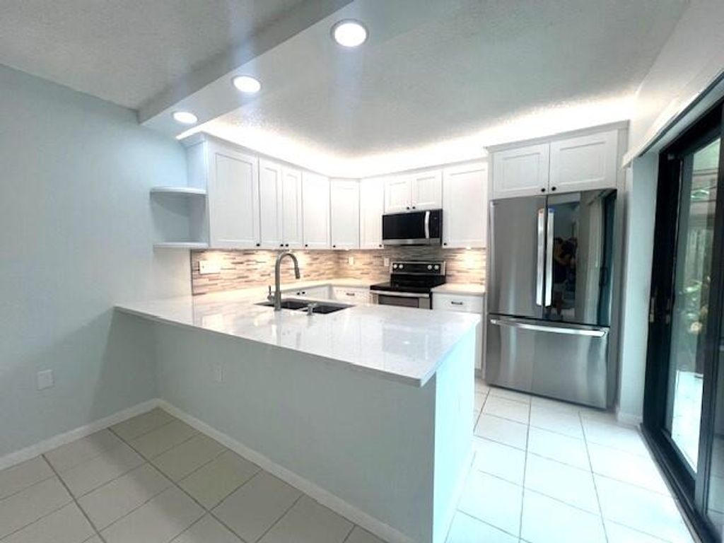 Photo of 2413 24th Court, Jupiter, FL 33477 (MLS # R11022725)