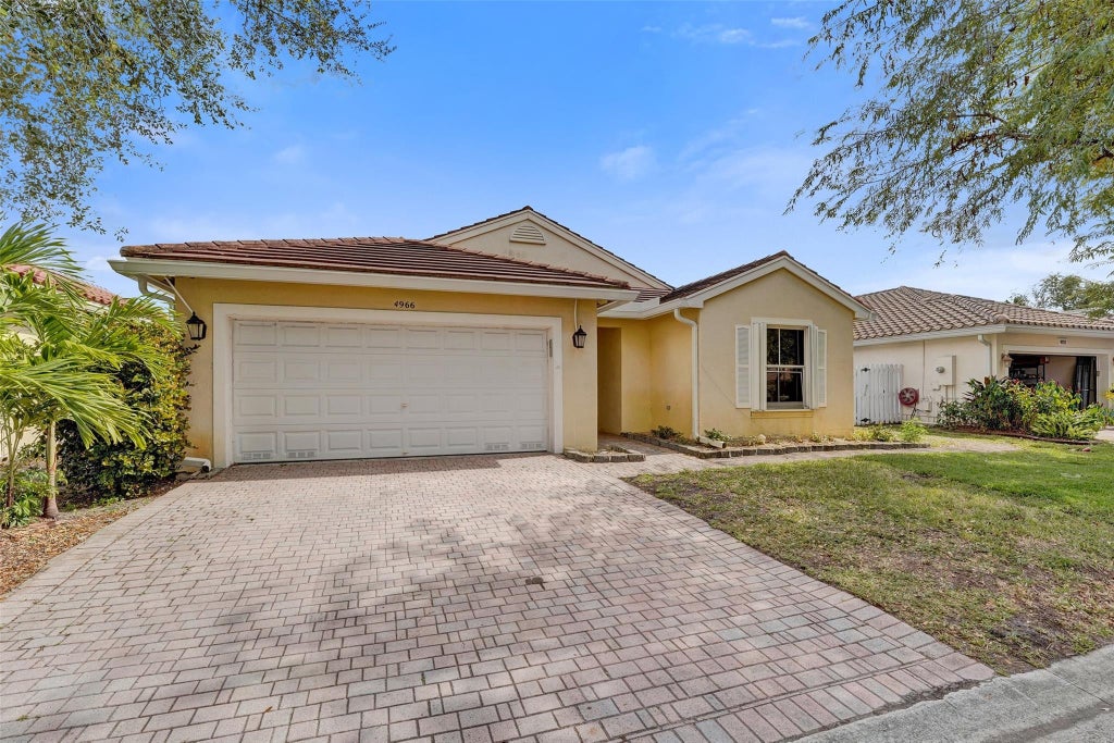 Photo of 4966 SW 33rd Terrace, Hollywood, FL 33312 (MLS # F10548235)