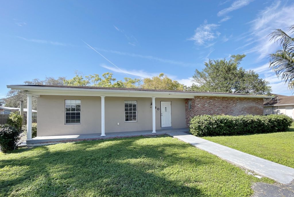 Photo of 140 Royal Palm Way, Belle Glade, FL 33430 (MLS # R10963642)