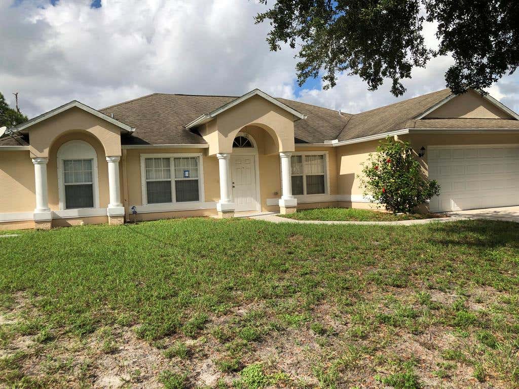 Photo of 705 SW Monsoon Road Rd, Port St Lucie, FL 34953 (MLS # R10833726)