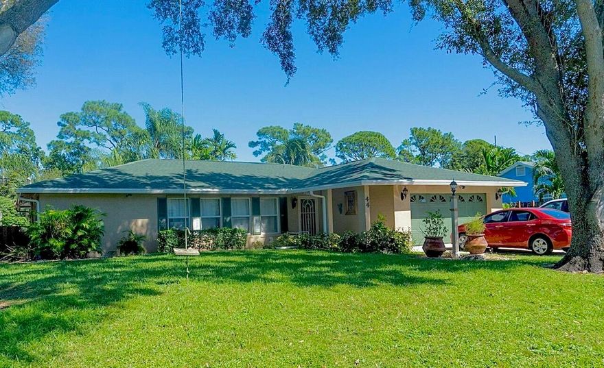 Florida Gardens community is one of the most desirable neighborhoods in Palm Beach. Boasting A+ rated school zone, and no HOA! This lovely 3 bedroom, 2 bath home has a fenced yard with an in ground heated swimming pool, and butterfly garden! A newer roof, and newer AC are among other updates.  Mango Rd is canal front, and no neighbors are directly behind the property.  Just minutes to Wellington Green mall and area beaches. You'll love it here!