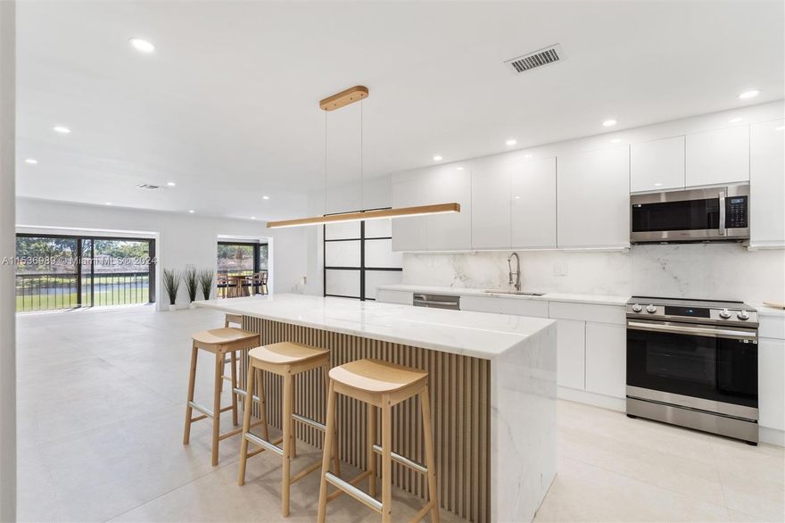 1810 SQFT of elegance! A/C balcony transformed into additional living space with custom ceilings, lighting, and a view like none other. Fully and professionally redesigned and renovated largest model condo overlooking lake and golf course in Boca Lago. 48x48 Brazilian porcelain tile floors, waterfall quartz countertops, backsplash and Island. Brand new appliances with cutting edge technology washer and dryer. Higher ceilings and oversized doors give this home a huge feel and look! LED and accent lighting throughout. Simply the finest unit available in the community. Boca Lago is a 55+ community with social activities years round. A golf and country club membership is available but NOT required.