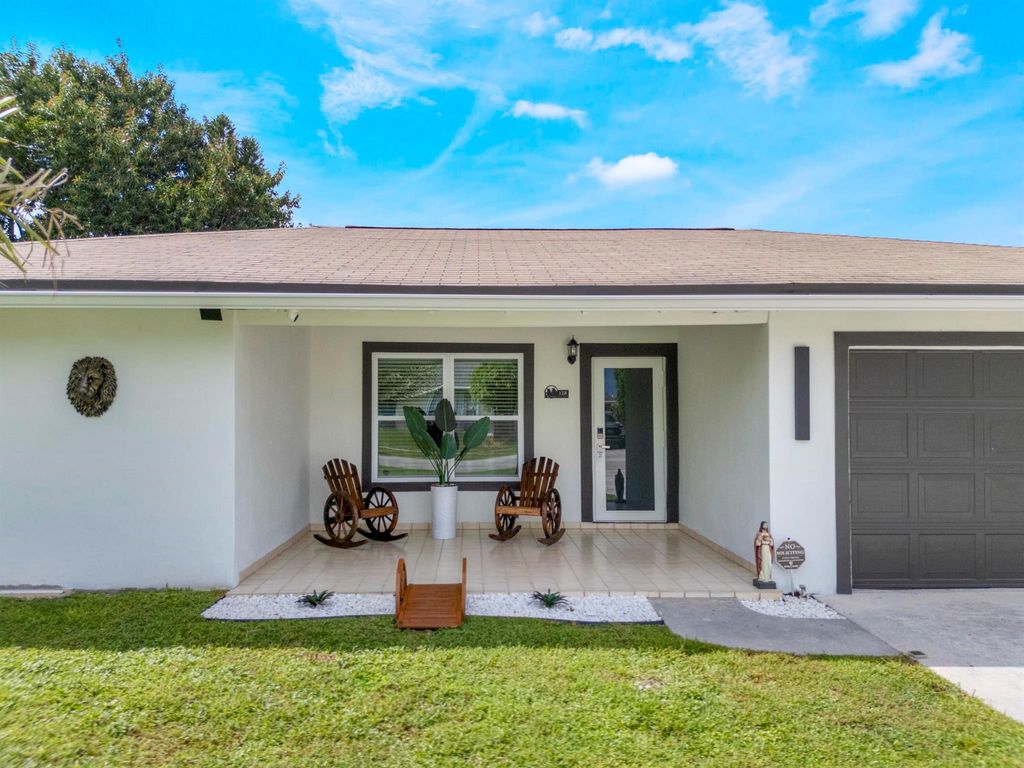 Photo of 128 Barcelona Drive, Royal Palm Beach, FL 33411 (MLS # R11133392)