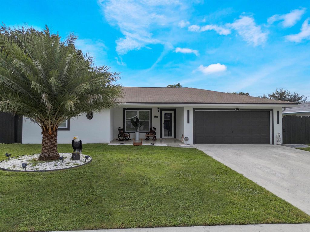 Photo of 128 Barcelona Drive, Royal Palm Beach, FL 33411 (MLS # R11133392)