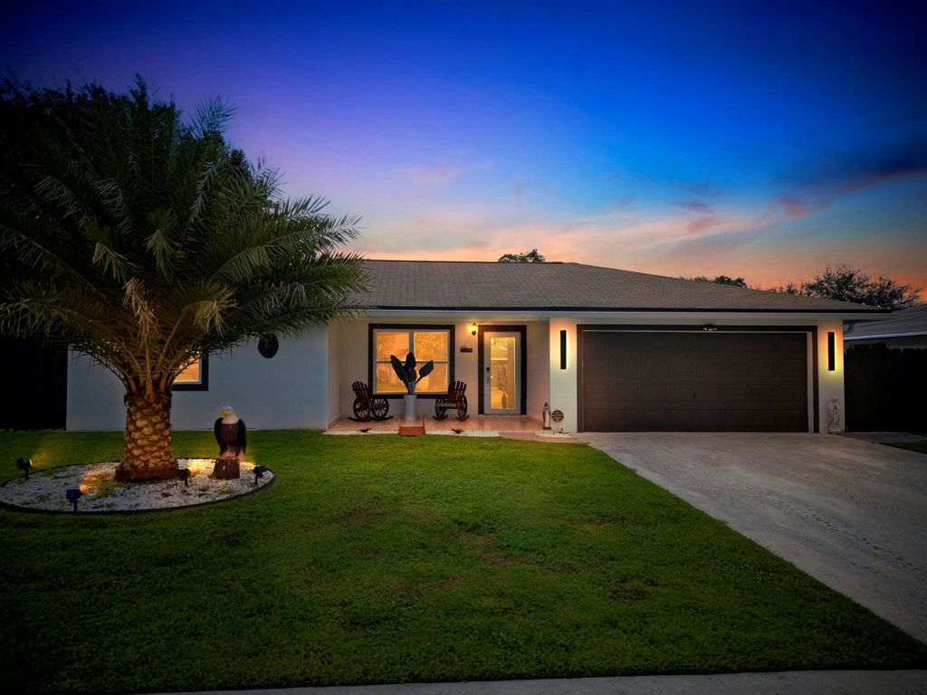 Photo of 128 Barcelona Drive, Royal Palm Beach, FL 33411 (MLS # R11133392)