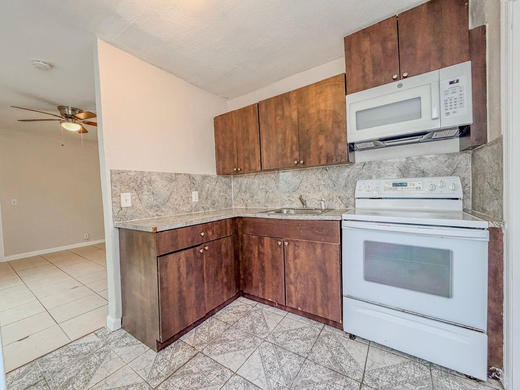 Photo of 1010 9th Street, West Palm Beach, FL 33401 (MLS # B26003131)