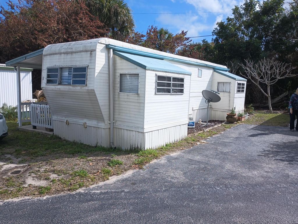 Photo of 11 Pleasant View Drive, Jensen Beach, FL 34957 (MLS # R11168922)