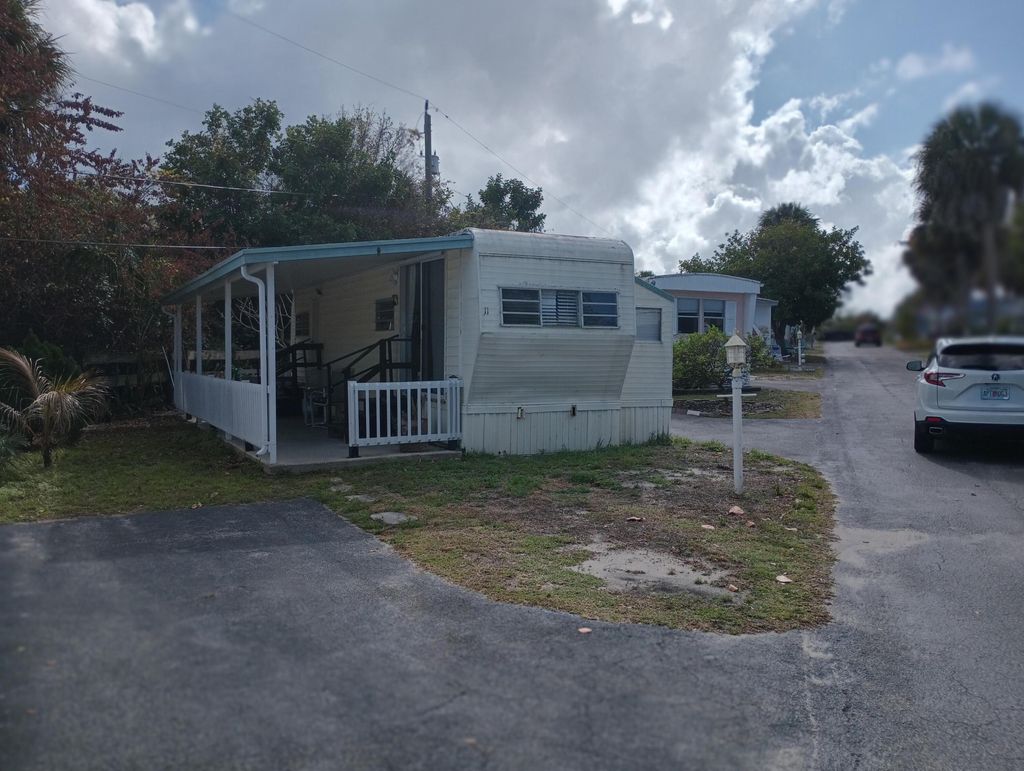 Photo of 11 Pleasant View Drive, Jensen Beach, FL 34957 (MLS # R11168922)