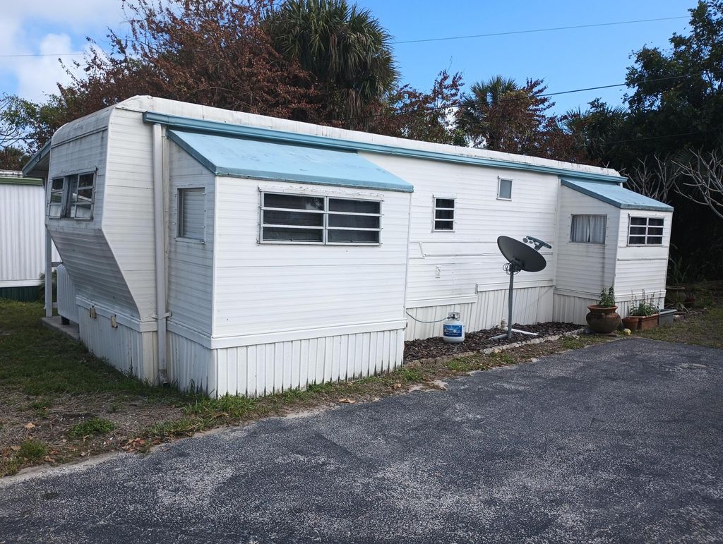 Photo of 11 Pleasant View Drive, Jensen Beach, FL 34957 (MLS # R11168922)