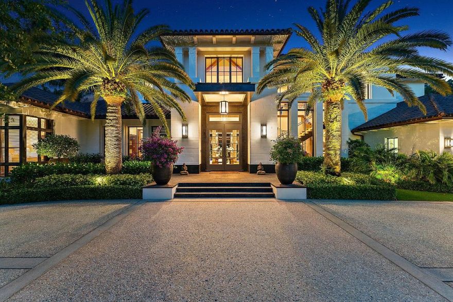 Located on nearly an acre along the second hole of the Nicklaus signature course at The Bears Club, this custom estate residence seamlessly integrates modern elements with timeless charm. This spectacular estate residence is a bespoke fusion of styles, blending the finest pieces from European and American design houses like Odegard and Lapchi , and lighting fixtures sourced from the prestigious Italian company Barovier and Toso. Intricate hand-painted wallpaper and stunning millwork adorn its interior, accentuating the architectural splendor.

The Miele kitchen, designed for hosting gatherings, features high-gloss lacquer cabinets complemented by an iridescent glass tile backsplash.

There have been many recent updates including the replacement and upgrades to the HVAC systems.