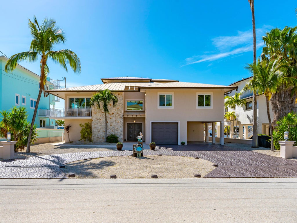Photo of 397 Laguna Avenue, Key Largo, FL 33037 (MLS # B26033298)