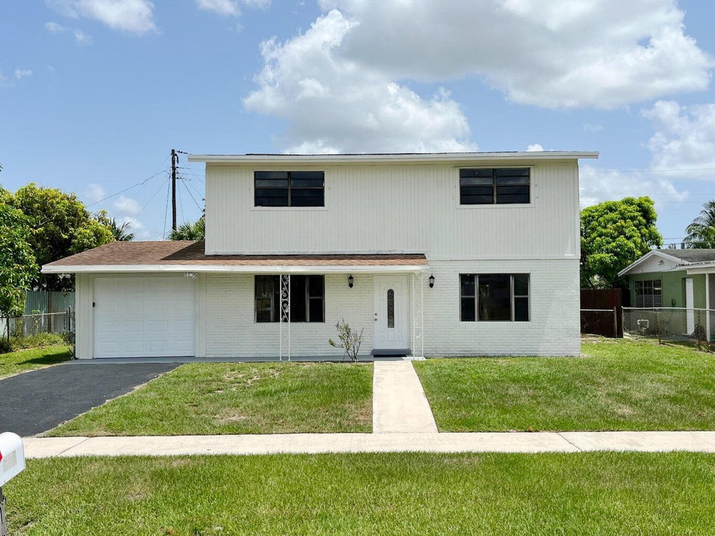 Photo of 5163 MARION Place, West Palm Beach, FL 33407 (MLS # B26078914)