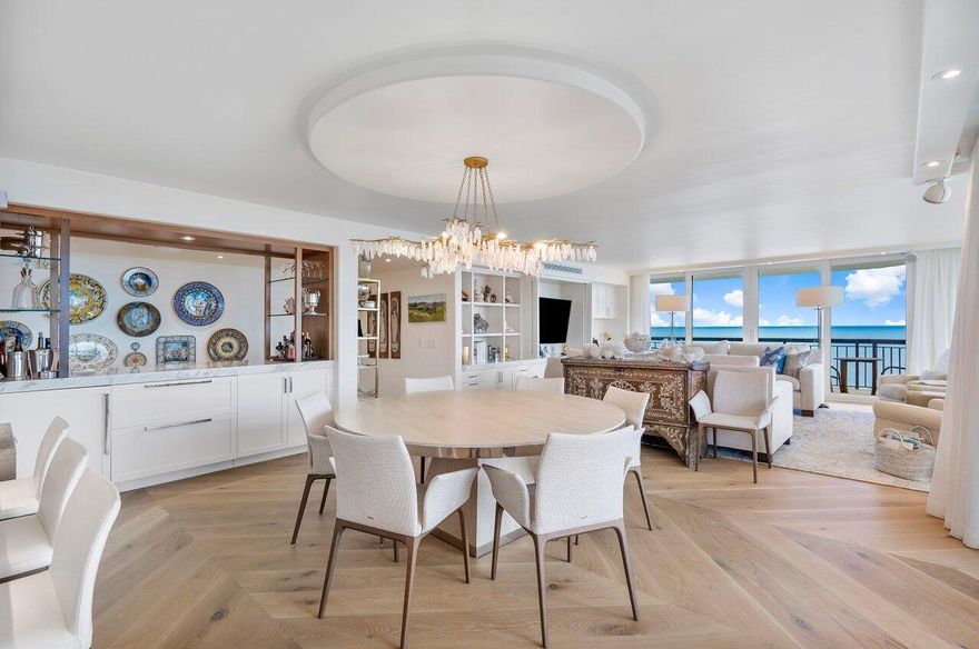 Exceptional South/East corner Penthouse with stunning ocean views from every room. It is rare that a renovation of this caliber is offered for sale. 3 en-suite bedrooms plus a beautiful poolside cabana. A welcoming foyer opens to a great room designed with an open kitchen, breakfast area and adjacent bar, gracious living and dining areas and 2 deep terraces to enjoy from sunrise to sunset. Highlights include ''french cut' white oak chevron wood flooring, color coded hurricane impact doors, motorized window treatments, Chefs kitchen with Top of the Line appliances, bespoke hardware, built in surround sound & security systems and abundant storage. Carlton Place is a full service building with a newly designed pool deck, fitness center, tennis, common areas & 2 car garage parking.