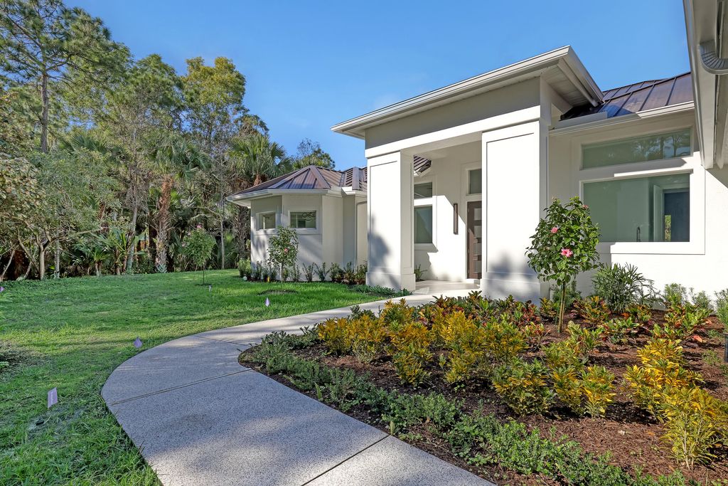 Photo of 11871 Randolph Siding Road, Jupiter, FL 33478 (MLS # R10938789)