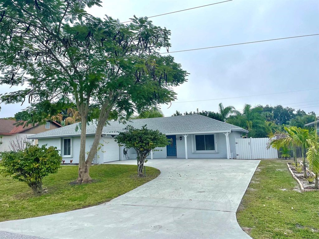 Photo of 8315 SE Boxwood Lane, Hobe Sound, FL 33455 (MLS # R10940489)