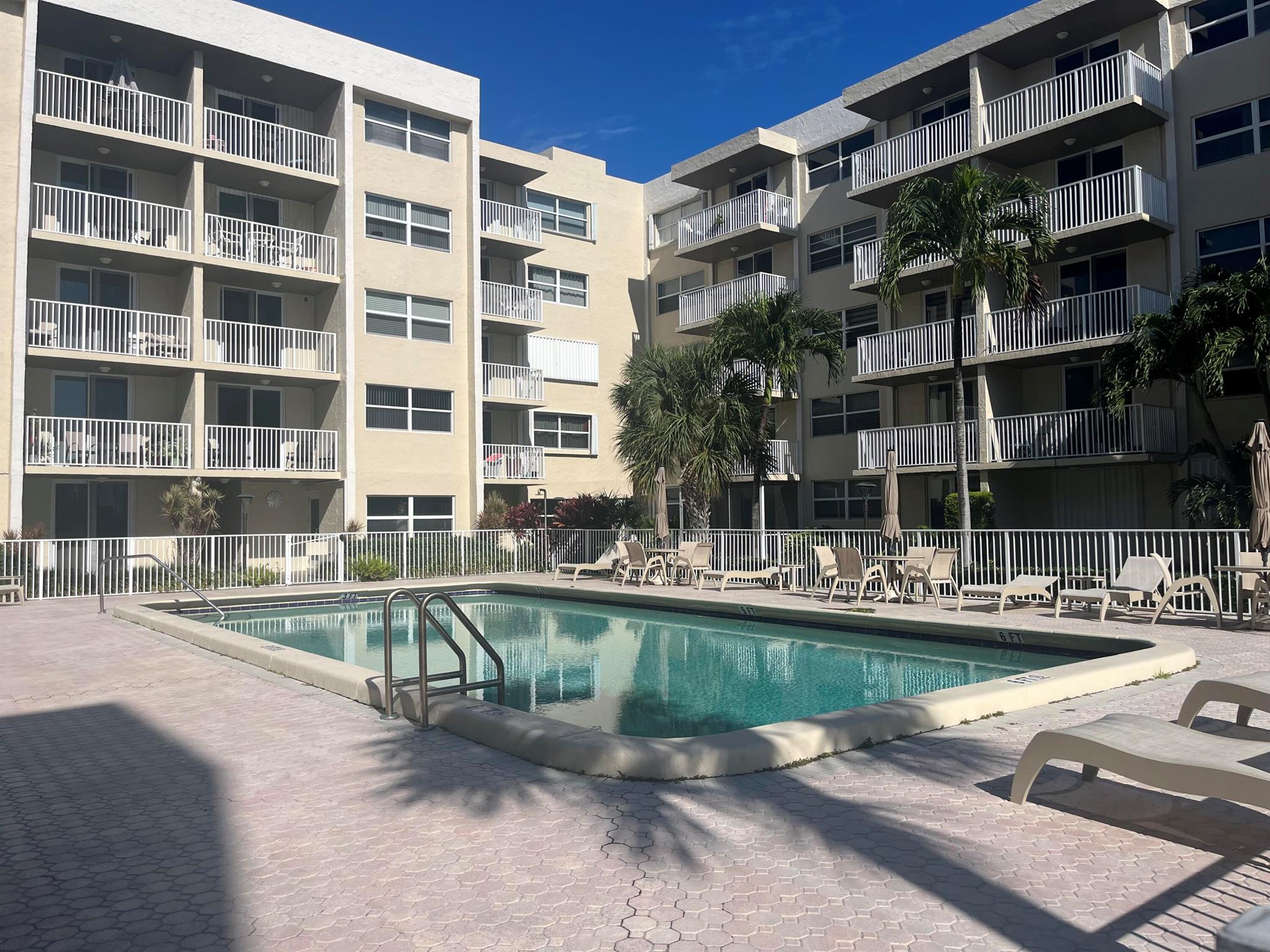 Fabulous RESORT STYLE Seasonal rental on A1A in BOCA RATON a few feet to the OCEAN!A tropical paradise awaits you for the winter months. Completely renovated and model perfect 1 bedroom/ 1.5 bath with a sleeper sofa in the living room. Amazing, fully equipped kitchen with white cabinetry, quartz counter-tops, stainless appliances plus a convenient washer & dryer. The spacious primary suite has a king size adjustable bed, ample closet and a luxury bath with a walk- in shower. There is also a half bath for you and your guests. The parking space ideally located and there are plenty of guest parking spaces. Boca South has a resort style pool, clubroom and bar-b que grill to enjoy. Your private balcony overlooks the pool and tropical landscaping with a slight ocean view. A Must SEE!,