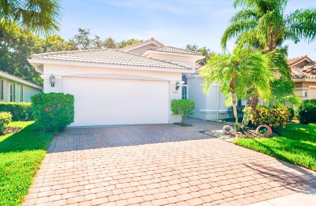 Photo of 6668 Rienzo Street, Lake Worth, FL 33467 (MLS # F10525085)