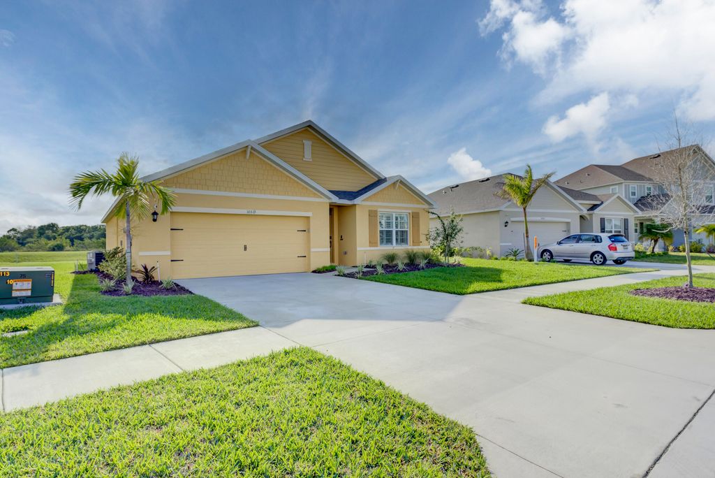 Photo of 10519 SW Vasari Way, Port Saint Lucie, FL 34987 (MLS # B26035226)