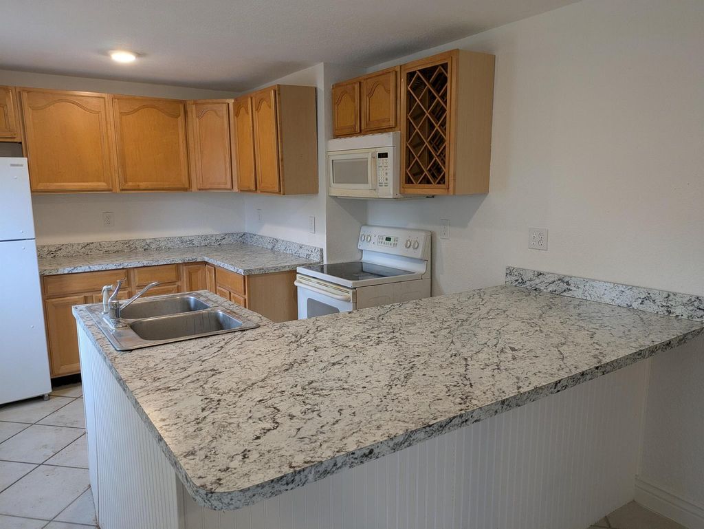 Photo of 12101 Colony Avenue, Palm Beach Gardens, FL 33410 (MLS # R11100130)