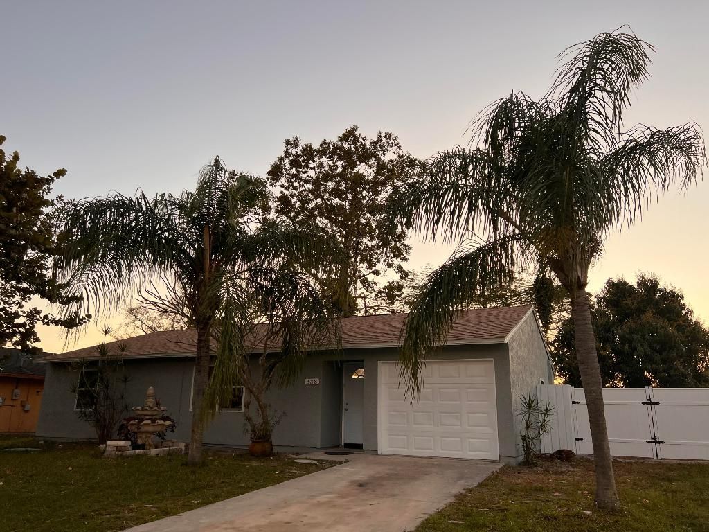 Photo of 838 SE Proctor Lane, Port Saint Lucie, FL 34983 (MLS # R10964935)