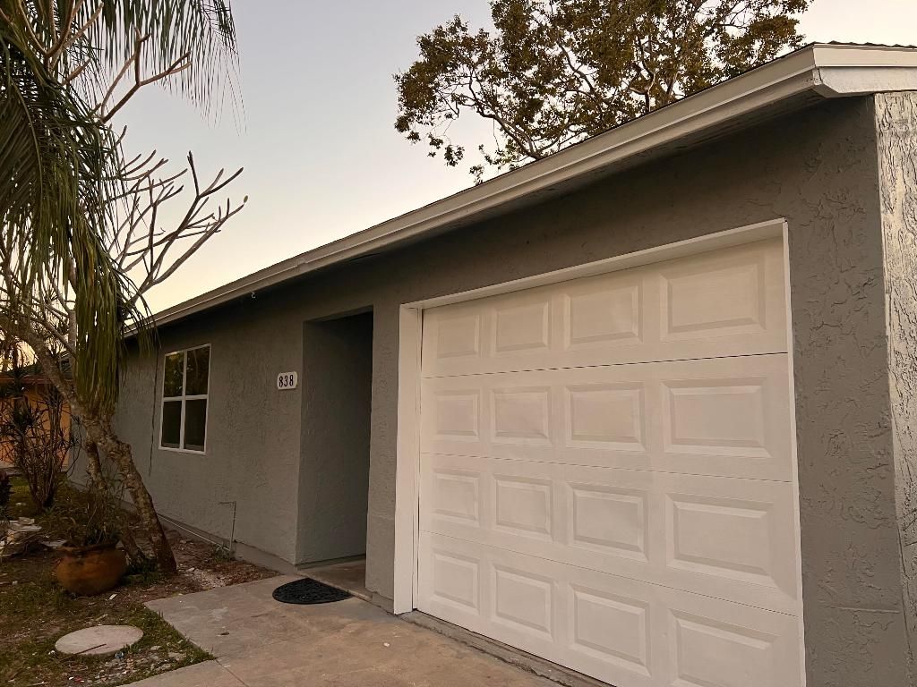 Photo of 838 SE Proctor Lane, Port Saint Lucie, FL 34983 (MLS # R10964935)